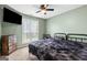 Cozy bedroom with ceiling fan, window and large closet at 470 Old Griffin Rd, Hampton, GA 30228