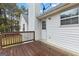 Well-maintained wooden deck showcasing the back of the house and providing outdoor living space at 470 Old Griffin Rd, Hampton, GA 30228