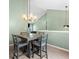 Inviting dining area with modern chandelier, and cozy seating for four people at 470 Old Griffin Rd, Hampton, GA 30228