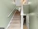 View of the carpeted stairs leading to the upper level of the house at 470 Old Griffin Rd, Hampton, GA 30228