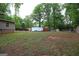 Expansive backyard offering ample space for various outdoor activities and potential landscaping at 208 Holliday Way, Carrollton, GA 30116