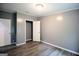 Bedroom features modern flooring, neutral paint, and ample closet space at 208 Holliday Way, Carrollton, GA 30116