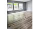 Room with hard surface floors, neutral paint and windows at 208 Holliday Way, Carrollton, GA 30116