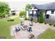 Great backyard with a fire pit and wooden chairs ready to host Gathering and friends at 3550 N Bogan Rd, Buford, GA 30519