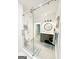 Modern bathroom with a glass-enclosed shower, sleek vanity, and stylish fixtures at 3550 N Bogan Rd, Buford, GA 30519