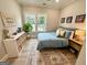 Cozy bedroom featuring a comfortable bed, natural light, and charming decor at 3550 N Bogan Rd, Buford, GA 30519