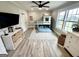 Bright bedroom features a unique bunk bed, a ceiling fan, and neutral colors to enhance the cozy atmosphere at 3550 N Bogan Rd, Buford, GA 30519