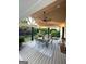 View of covered deck featuring a ceiling fan, outdoor rug, and outdoor furniture at 3550 N Bogan Rd, Buford, GA 30519