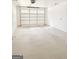 Clean and spacious garage with a functional layout and ample room for parking and storage at 3550 N Bogan Rd, Buford, GA 30519