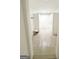 Hallway with custom built in cabinets and a built in bench on woodgrain flooring at 3550 N Bogan Rd, Buford, GA 30519