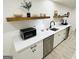 Contemporary kitchenette with quartz countertops, a dishwasher, and ample storage at 3550 N Bogan Rd, Buford, GA 30519