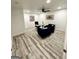 Office with modern furniture, art and ceiling fan at 3550 N Bogan Rd, Buford, GA 30519