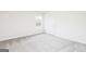 Bedroom with carpet and window near door at 279 Limestone Circle, Conyers, GA 30013