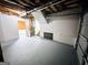 Spacious unfinished basement with gray painted floor and white walls, ready to be personalized at 473 Amy Blvd, Temple, GA 30179