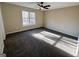 Bedroom featuring carpet, neutral walls, and a window providing natural light at 473 Amy Blvd, Temple, GA 30179