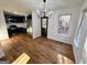 Charming dining area with hardwood floors adjacent to a stylish kitchen at 473 Amy Blvd, Temple, GA 30179