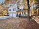 Charming two-story home with a two-car garage and a front porch at 473 Amy Blvd, Temple, GA 30179
