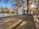 Charming two-story home with two-car garage, front porch and driveway surrounded by foliage at 473 Amy Blvd, Temple, GA 30179