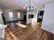 The living room has hardwood floors, neutral paint, and many windows for natural light at 473 Amy Blvd, Temple, GA 30179