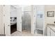 En suite bathroom with a glass enclosed shower adjacent to the main bedroom at 175 Campaign Trl, Fayetteville, GA 30214