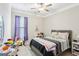 Cozy bedroom with natural light, neutral walls, and complementing decor at 175 Campaign Trl, Fayetteville, GA 30214