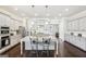 Bright kitchen featuring granite countertops, stainless steel appliances, and open layout at 175 Campaign Trl, Fayetteville, GA 30214