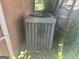 Exterior shot of the home's air conditioning unit, surrounded by greenery at 1800 Austin Dr, Decatur, GA 30032