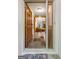 Inviting foyer showcases hardwood floors, detailed trim, and a glimpse into the warm living space at 145 Flat Creek Ct, Fayetteville, GA 30214