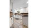 Eat-in kitchen with updated cabinets and appliances at 145 Flat Creek Ct, Fayetteville, GA 30214