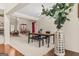 Open-concept dining room featuring neutral walls, stylish chandelier, and bright, airy atmosphere at 3129 Oak Ridge Ln, Loganville, GA 30052