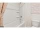 Clean, bright bathroom with a modern bathtub and shower, along with a white toilet at 146 Oakchase Park Lane, Hampton, GA 30228