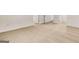 Expansive room with neutral carpeting and accessible doorways at 146 Oakchase Park Lane, Hampton, GA 30228