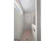 Modern walk-in shower featuring tiled walls, a rainfall showerhead, and glass enclosure at 2124 Gaddis Rd, Canton, GA 30115