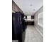 View of kitchen with black appliances, dark cabinets, and gray countertops for a modern feel at 4712 Rockstile Way, Stone Mountain, GA 30083