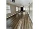 Spacious living room showcasing new floors, neutral walls, and a charming fireplace at 4712 Rockstile Way, Stone Mountain, GA 30083