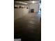 A large basement with concrete floors and block wall is ready for customization at 4064 Sunset Sw Dr, Atlanta, GA 30331