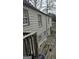 Home exterior showcasing the siding, windows, and a partial view of the yard and surrounding area at 4064 Sunset Sw Dr, Atlanta, GA 30331