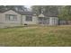 Quaint single-story home with a spacious front yard, showing its potential for landscaping at 4064 Sunset Sw Dr, Atlanta, GA 30331