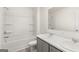 Bright bathroom featuring a double sink vanity, shower and tub combination with white ceramic tile walls at 588 Whitman Ln # 23, Stockbridge, GA 30281
