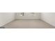 Bright bedroom with two windows offering natural light and neutral-toned carpeting at 588 Whitman Ln # 23, Stockbridge, GA 30281
