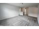 Spacious bedroom with plush carpets and neutral-toned walls at 883 Ironhorse Sw Ln, Mableton, GA 30126