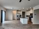 Open concept kitchen with stainless steel appliances and a view to living area at 883 Ironhorse Sw Ln, Mableton, GA 30126