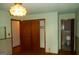 Bedroom with wood trim, two windows, a ceiling light, closet, and a bathroom at 3296 Columbia Woods Dr, Decatur, GA 30032