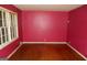 Living room featuring hardwood floors, bright natural light, and fresh paint at 3296 Columbia Woods Dr, Decatur, GA 30032