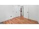 Bedroom showing hardwood floors and two doorways at 4327 Welligton Hill Ln, Snellville, GA 30039