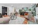 Open concept living space featuring seamless flow between living room, kitchen, and dining area at 4327 Welligton Hill Ln, Snellville, GA 30039