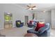 Spacious living room with neutral carpet and comfortable furniture at 4811 Nevilly Way, Marietta, GA 30066