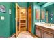Modern bathroom featuring a sauna room, vanity, and sleek fixtures at 120 Hermitage Pl, Peachtree City, GA 30269