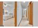 Bright hallway offering access to the bedrooms at 120 Hermitage Pl, Peachtree City, GA 30269