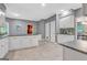 Spacious kitchen with white cabinetry, gray countertops, and tile flooring at 120 Hermitage Pl, Peachtree City, GA 30269
